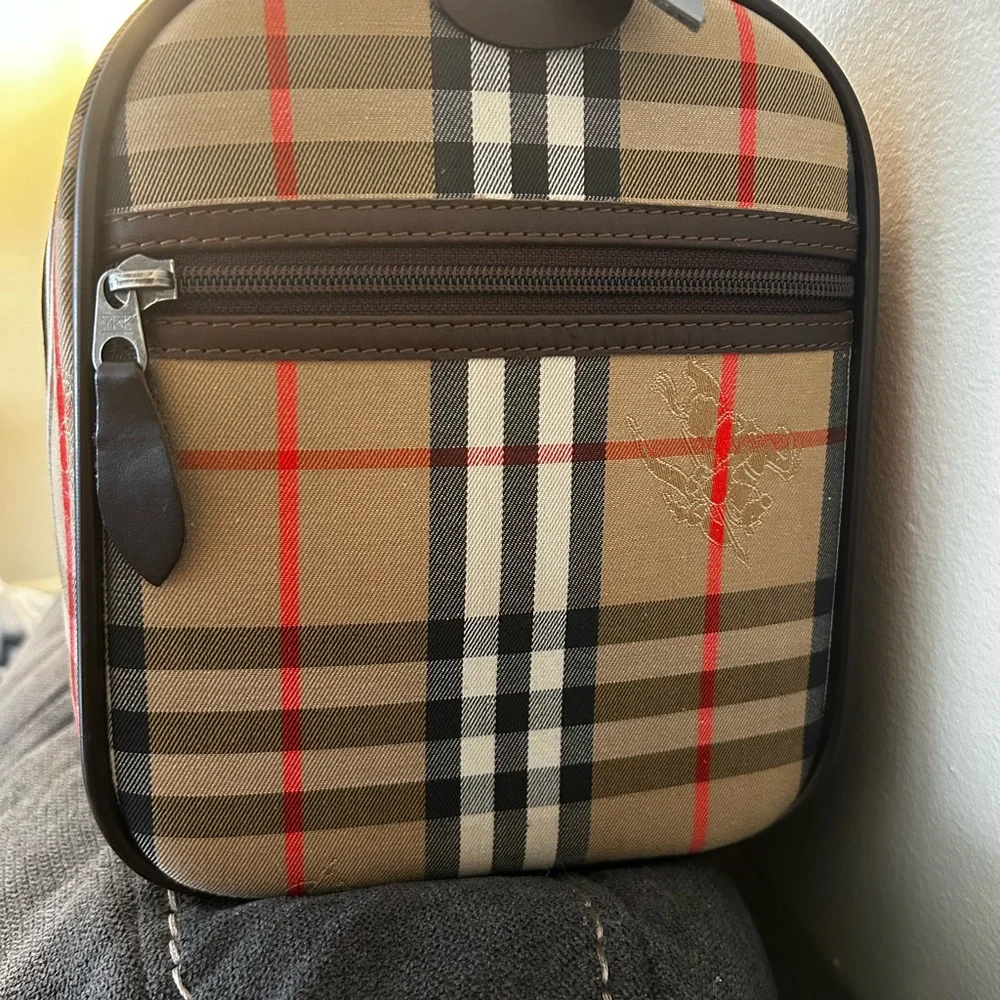 Burberrys Haymarket Boston Tan Duffel with Brown Leather Trim 10H x 19W inches